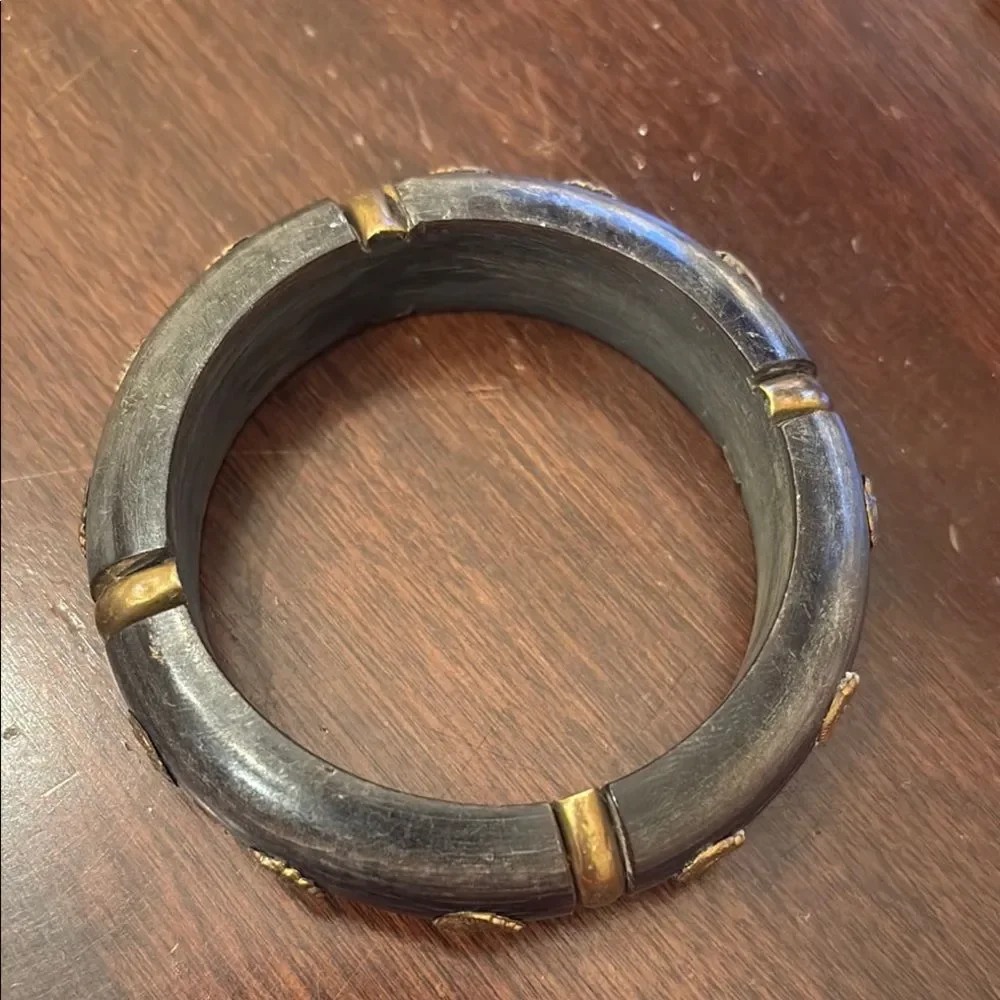Black and Gold Bracelet with Unique Embedded Flowers